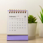 Premium Photo Desktop Calendar For February 2023 On A Light Background